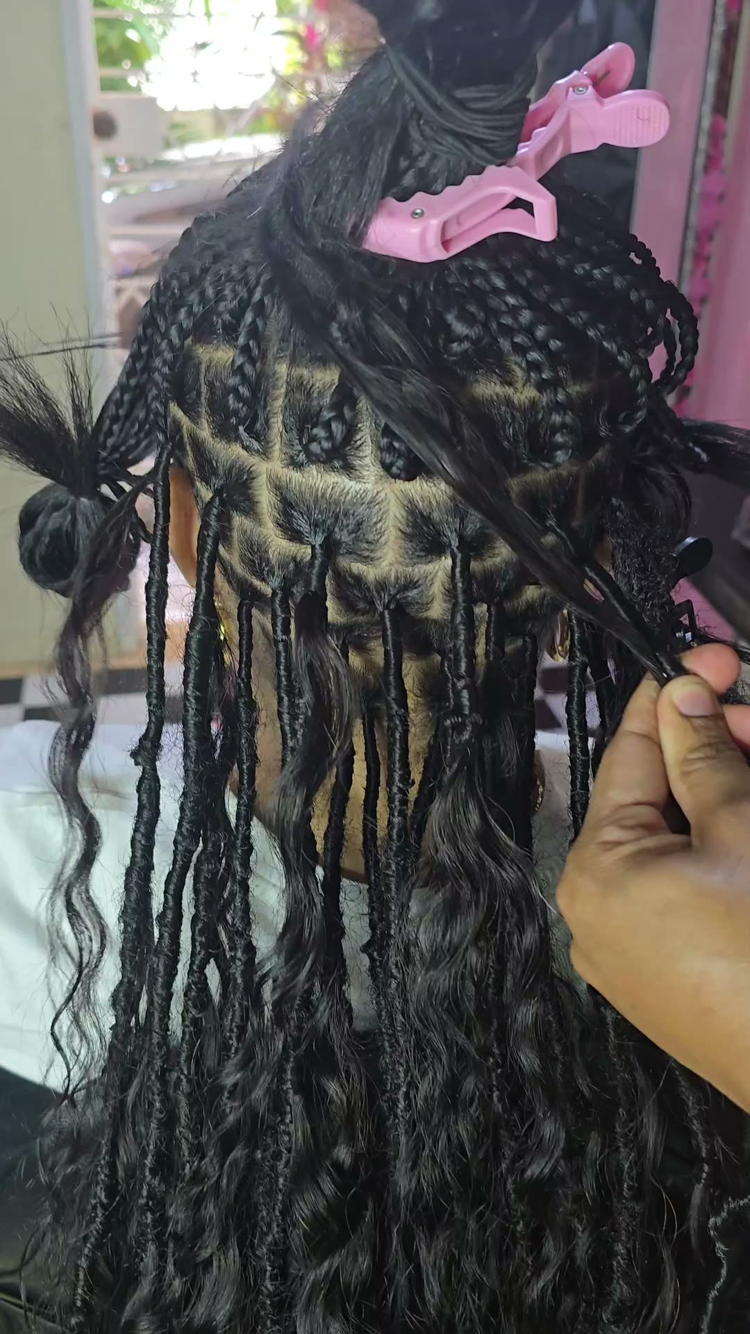 Clean parting grid during a boho locs install